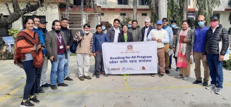 The participants are posing outside of the Nepalgunj Sub-Metropolitan Building on 15 Feb 2021.